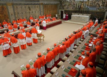 Cardinals from around the world line up in the Vatican's Sistine Chapel March 12, 2013, to take their oaths at the beginning of the conclave to elect a successor to Pope Benedict XVI. The following day, on the fifth ballot, they elected Cardinal Jorge Mario Bergoglio of Buenos Aires, Argentina, who chose the name Francis. (CNS photo/Vatican Media)